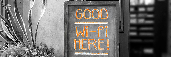 Chalboard with "Good Wi-fi Here!" written on it